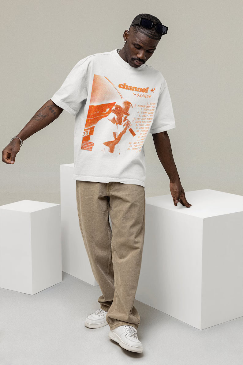 Nomad.Ma oversized T-shirt featuring Frank Ocean Channel Orange album artwork, premium music streetwear style.