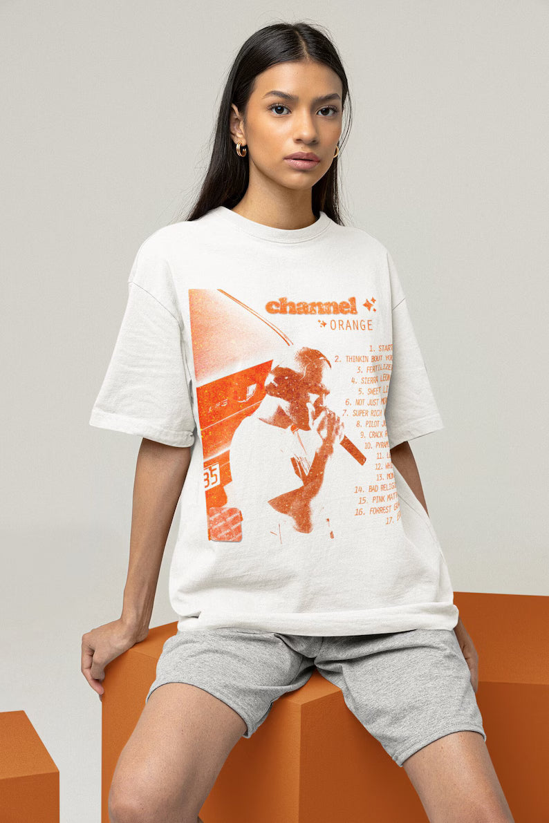 NOMAD Frank Ocean Channel Orange album oversized T-shirt in white with graphic print, streetwear style, by Nomad.Ma